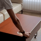 35'' Rectangular Solid Wood Coffee Table with Locking Wheels and Multifunctional Design in Caramel