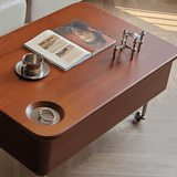 35'' Rectangular Solid Wood Coffee Table with Locking Wheels and Multifunctional Design in Caramel