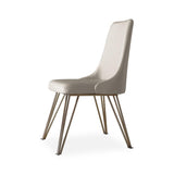 Chaise de salle à manger en faux cuir moderne avec des jambes en acier inoxydable