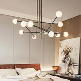 Modern 12-Light Warm Light Sputnik Chandelier in Black & Gold