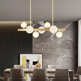 White Globe Shade 12-Light Linear Island Light in Gold