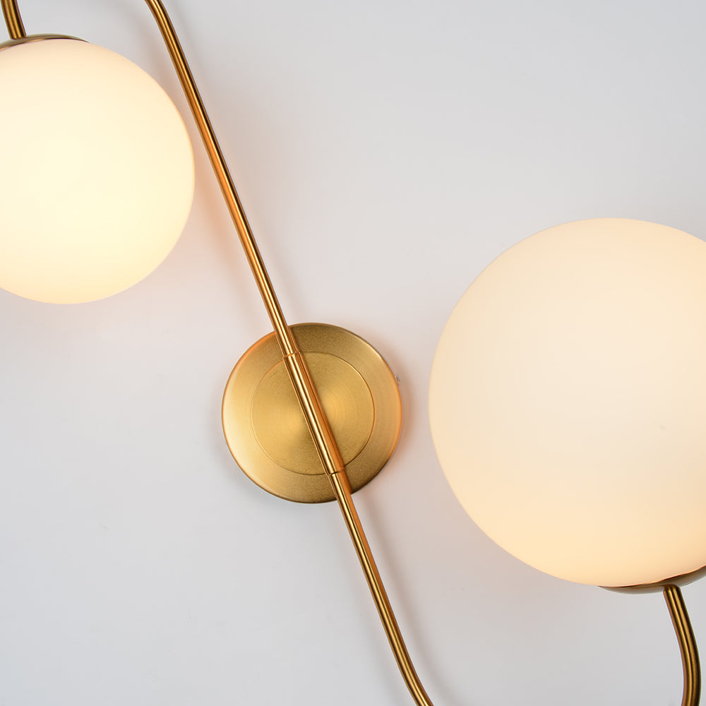 Modern Chic Milky White Globe Glass Shade Two-Light Indoor Wall Lamp in Aged Brass