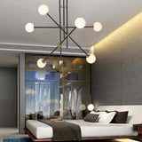 Modern 12-Light Warm Light Sputnik Chandelier in Black & Gold