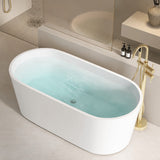A modern bathroom featuring a freestanding bathtub and stylish faucet against a minimalistic backdrop.
