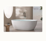 A modern bathtub set in a serene bathroom setting with a wooden stool and minimalist decor.