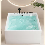 A square white bathtub filled with clear water, featuring a modern faucet and showerhead.