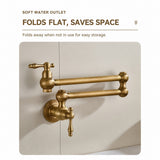 A close-up of a brass wall-mounted folding pot filler faucet with two articulated arms and a lever handle, shown against a tiled wall.