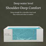 A modern bathtub with a deep water level showcased against a plain green background.