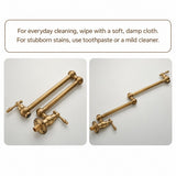 Two antique brass dual-handle pot filler faucets shown on a plain background from different angles.