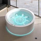 A modern round bathtub with glowing edges and water splashing in a stylish setting.
