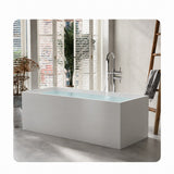 A modern freestanding bathtub displayed in a stylish bathroom setting with natural light.