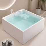 A modern square bathtub with a serene water surface and control panel.