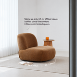 Brown chenille armless swivel chair by sheer curtains with floor space labels 34.6"/88cm and 33.1"/84cm
