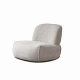 Light gray upholstered swivel barrel chair at an angle on a white studio background
