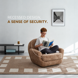 Brown textured swivel barrel chair, man reading cross-legged, dashed back outline in bright room