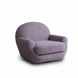 Muted purple upholstered swivel barrel chair seen at an angle on a white studio background
