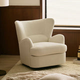 Cream textured swivel barrel chair on a rug by a wood-panelled wall and shuttered window.