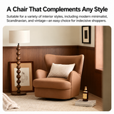 Cognac swivel barrel chair with cream cushion in a wood-panelled room with ball floor lamp