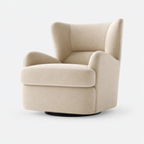 Beige swivel barrel chair with curved back, thick cushion, black base on white.