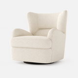 Cream boucle swivel barrel chair on a white studio background, shown in three-quarter view.