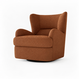 Rust-brown textured swivel barrel chair with wingback arms on a white studio background.