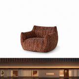 Rust-brown textured swivel barrel chair in a white studio setting above a modern facade