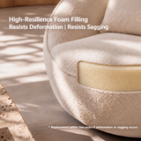 Close-up of cream bouclé barrel chair seat with a cutaway revealing yellow foam filling, sunlit floor