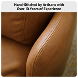 Close-up of the tan leather-look barrel chair arm showing double-stitched seams and smooth grain