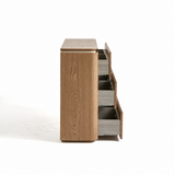 Side view of a wood-grain sideboard with four drawers open on a white studio background