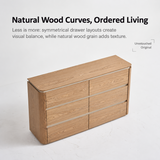 Light wood-grain six-drawer sideboard in a square studio layout with English copy