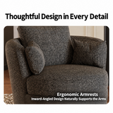 Close-up of a dark grey textured swivel barrel chair with two cushions on a wood floor