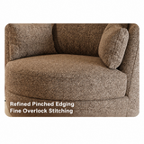Close-up of brown woven upholstery on a swivel barrel chair seat and armrest, showing piped edging and overlock stitching