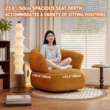 Ochre chenille swivel barrel chair with a woman sitting cross-legged, seat dimensions labeled