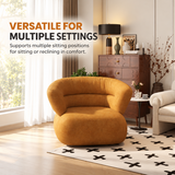 Ochre chenille swivel barrel chair beside a bright window, wooden dresser and cream armchair in a living room