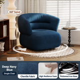 Deep navy blue chenille swivel barrel chair in a sunlit living room, with fabric, foam and iron base detail panels