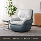 Deep blue swivel barrel chair with light gray cushions on a gray rug beside a plant and side table, with a size caption below