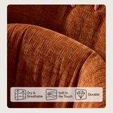Close-up of rust-orange wavy chenille fabric on a swivel barrel chair, with fingers touching the ribbed texture