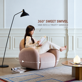 Woman reading in a blush velvet swivel barrel chair, 360° swivel arrow graphic, paneled room, floor lamp
