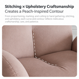 Dusty pink velvet swivel barrel chair close-up of curved back and seat stitching.