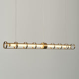 Moderne Goldzylinder-Kücheninsel-Licht-lineare Pendelleuchte für Esszimmer