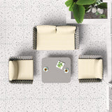 4 pièces de canapé sectionnel extérieur avec des sièges en sangle et des coussins en beige et gris
