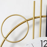 Reloj de pared redondo 3D Reloj de casa de metal silencioso geométrico con péndulo dorado