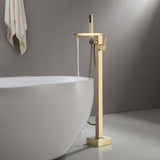 ドリーブラシをかけた金の自立浴槽フィラーフロアマウントバスタブ蛇口とハンドシャワー
