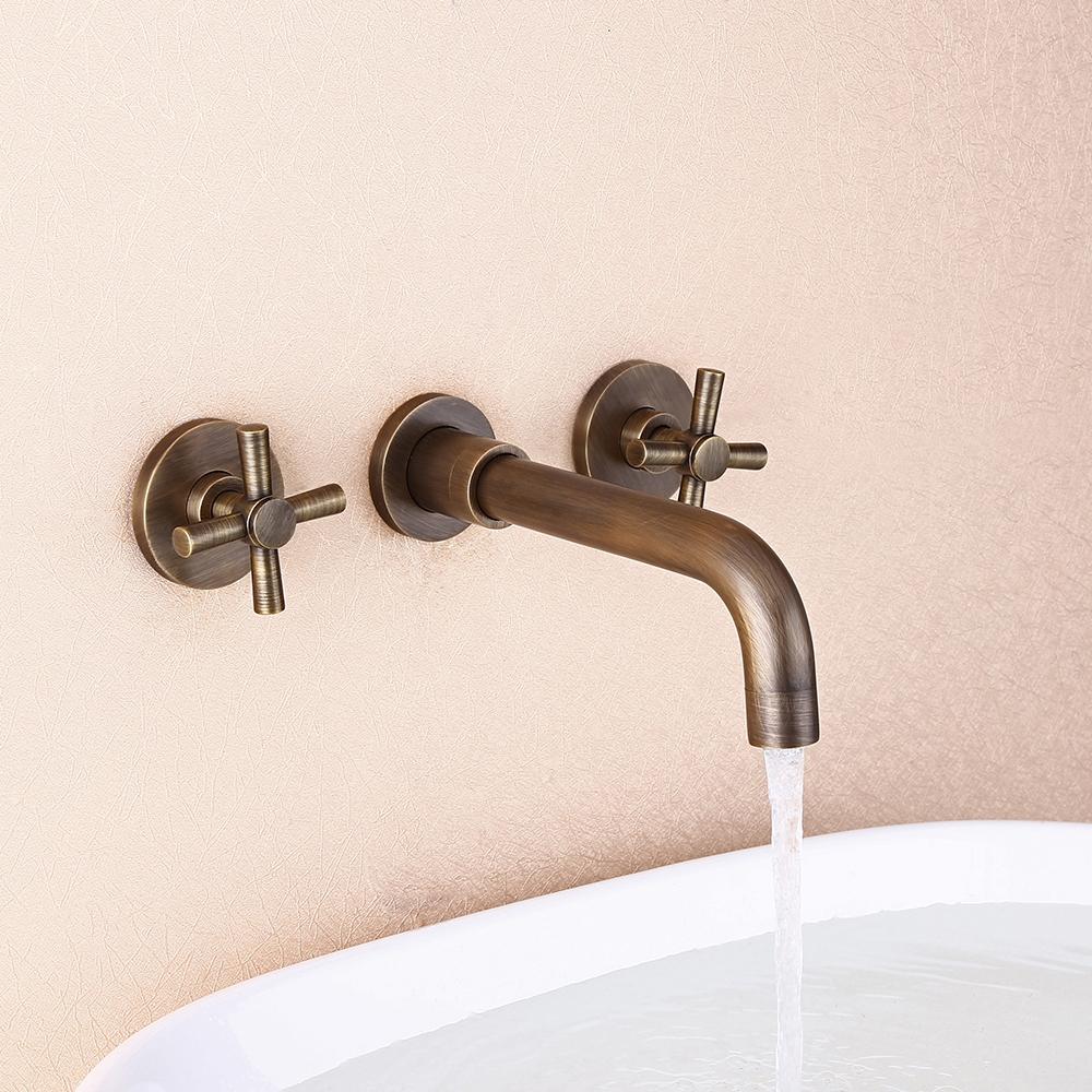 Melro Classic Wall Mounted Double Cross Handle Bathroom Sink Faucet in Antique Brass