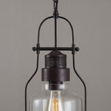 Lámpara colgante de farol de vidrio y metal oxidado industrial de 1 luz