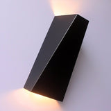 Aplique de pared hacia arriba y hacia abajo de una sola luz de metal artístico simple contemporáneo en negro