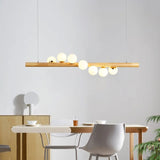 Lámpara colgante de isla de cocina de 7 luces con globo de vidrio lineal moderno
