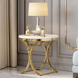 Moderna y lujosa mesa auxiliar redonda de piedra blanca con base en X, mesa auxiliar en dorado
