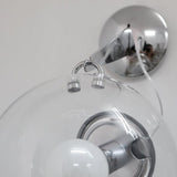 Aplique de pared de burbujas con pantalla de bola de vidrio transparente y acabado cromado