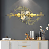 Reloj de pared extragrande de metal moderno 3D con marco geométrico dorado